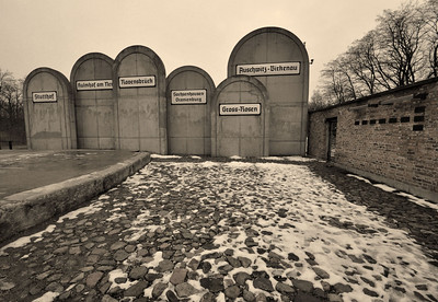 six large tombstone markers apart of the lodz ghetto memorial 